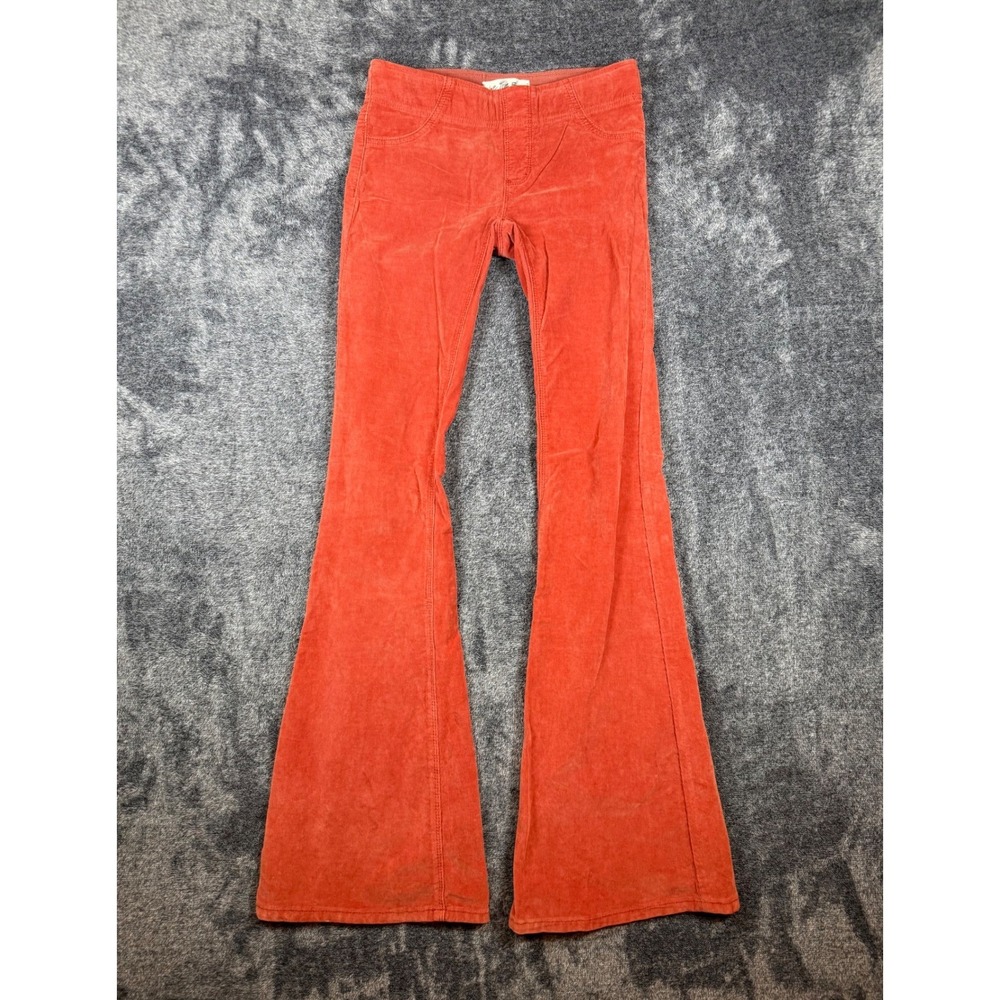 Free People Corduroy Flare Pants in Rust Orange
